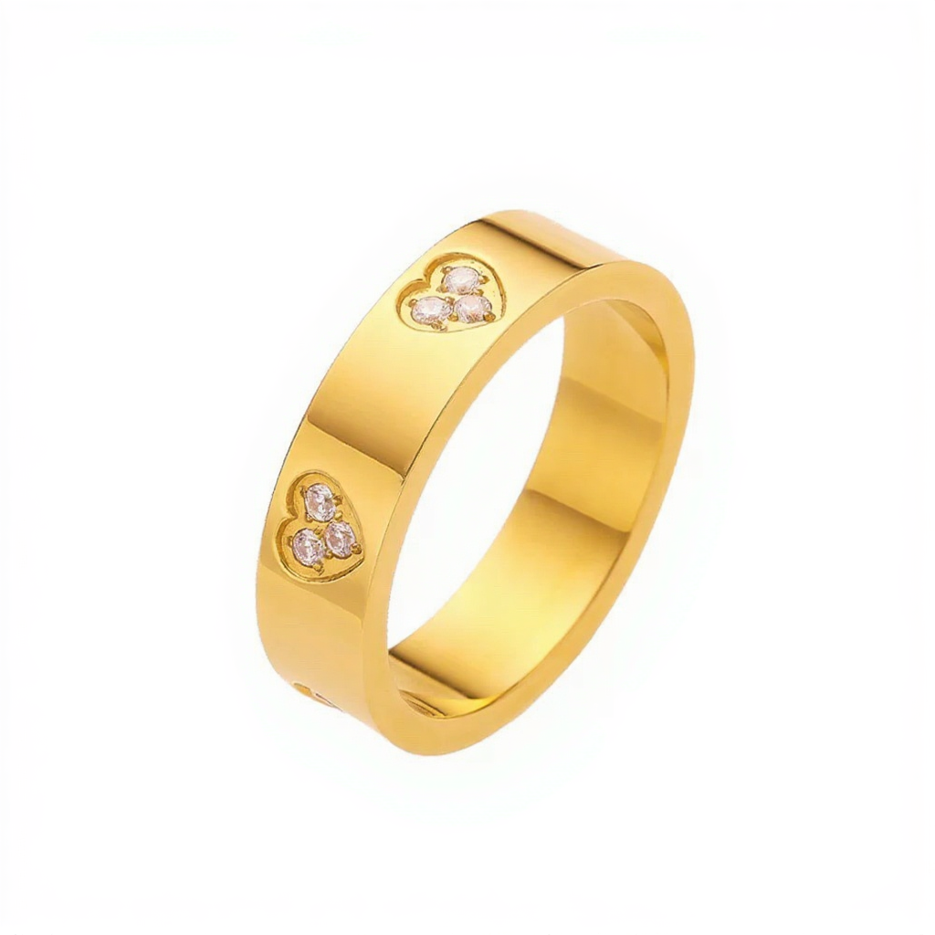Gold ring with heart designs on a white background