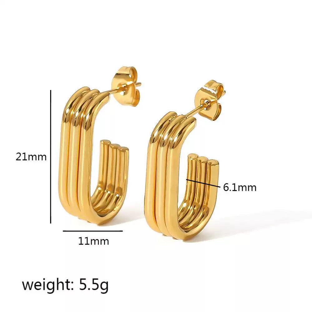 Gold hoop earrings with measurements on a white background