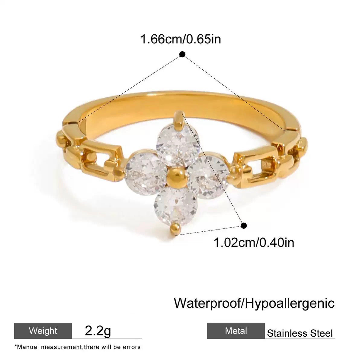 Gold ring with diamond-like stones and measurements on a white background