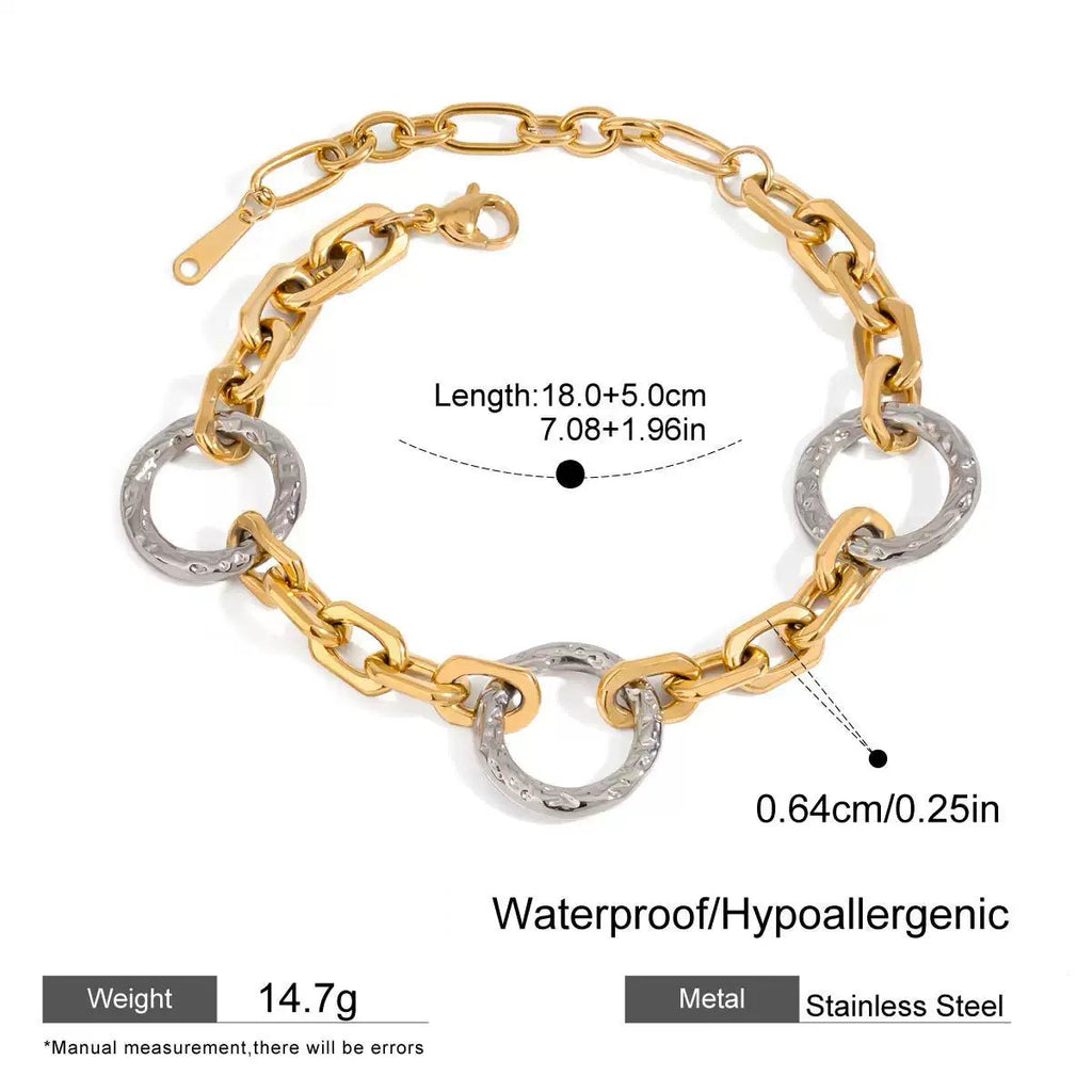 Gold and silver chain bracelet with measurements and product details on a white background