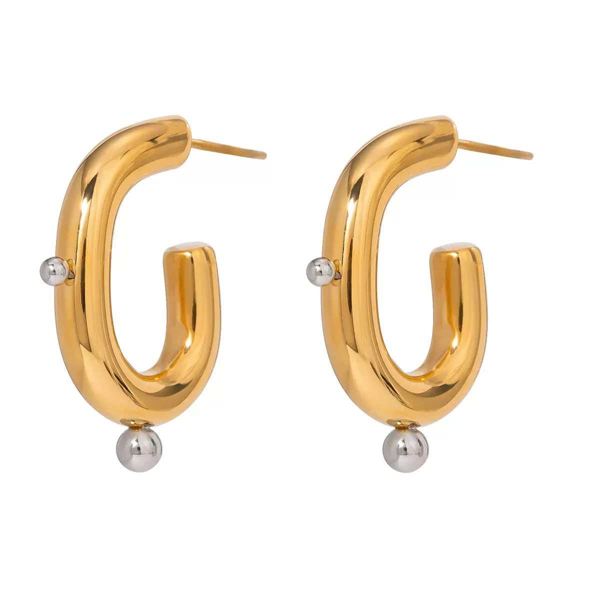 Gold hoop earrings with small silver beads on a white background