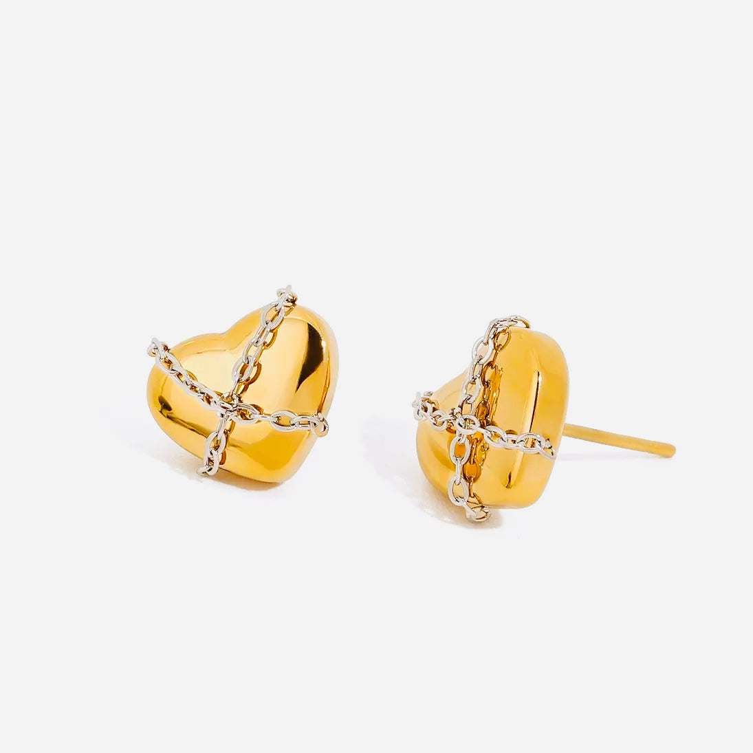 Gold heart-shaped earrings with chain details on a white background