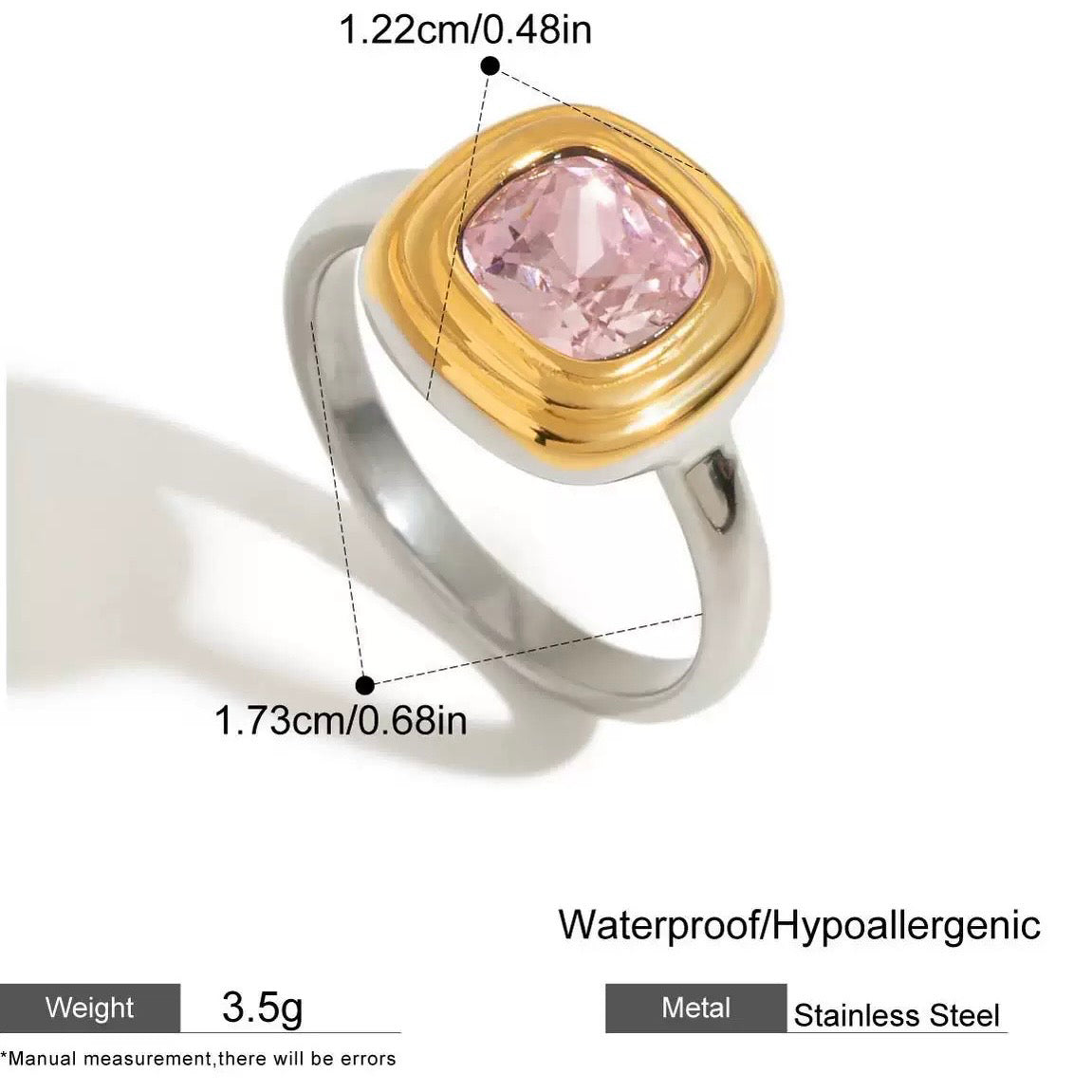 Ring with pink gemstone and gold accents, showing measurements and material details.