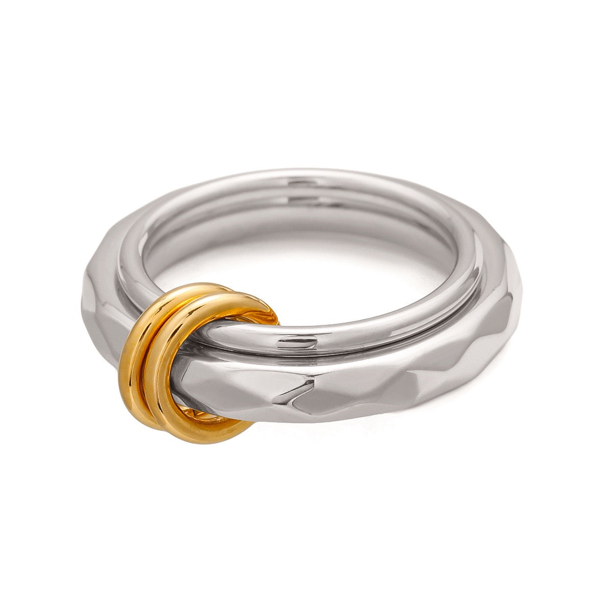 Silver ring with a gold interlocking band on a white background