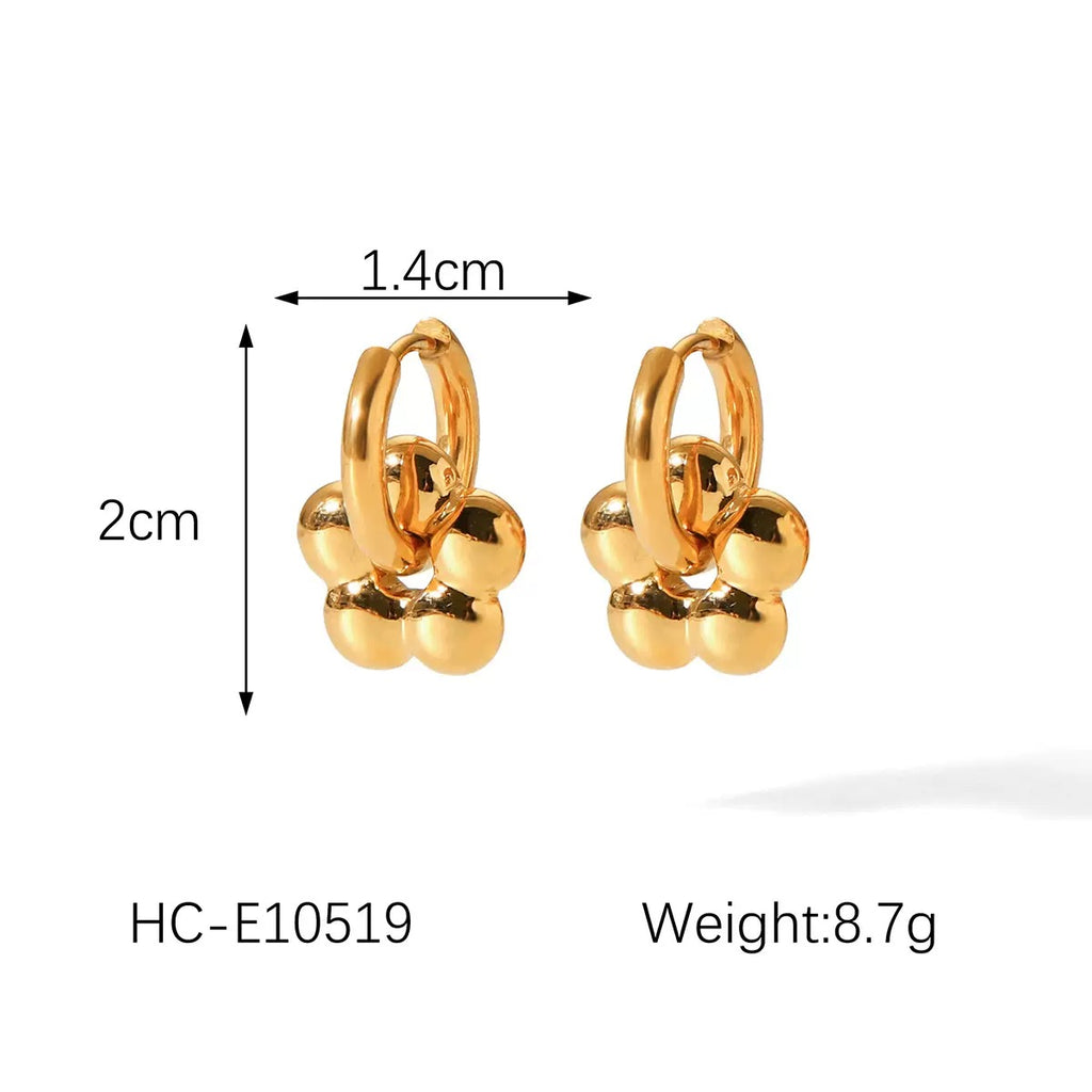 Gold hoop earrings with measurements on a white background