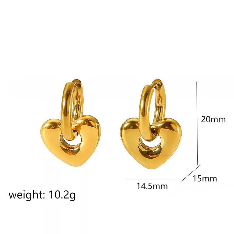 Gold heart-shaped hoop earrings with measurements and weight on a white background