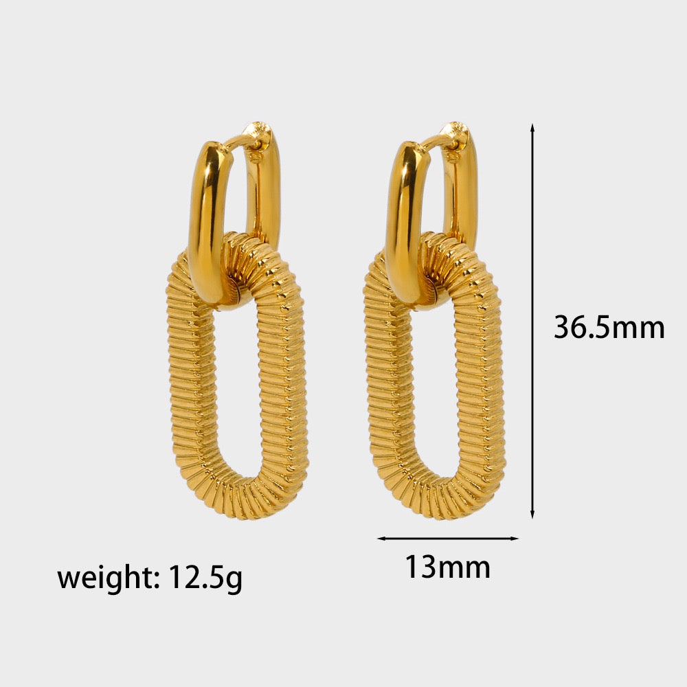 Gold hoop earrings with measurements on a white background