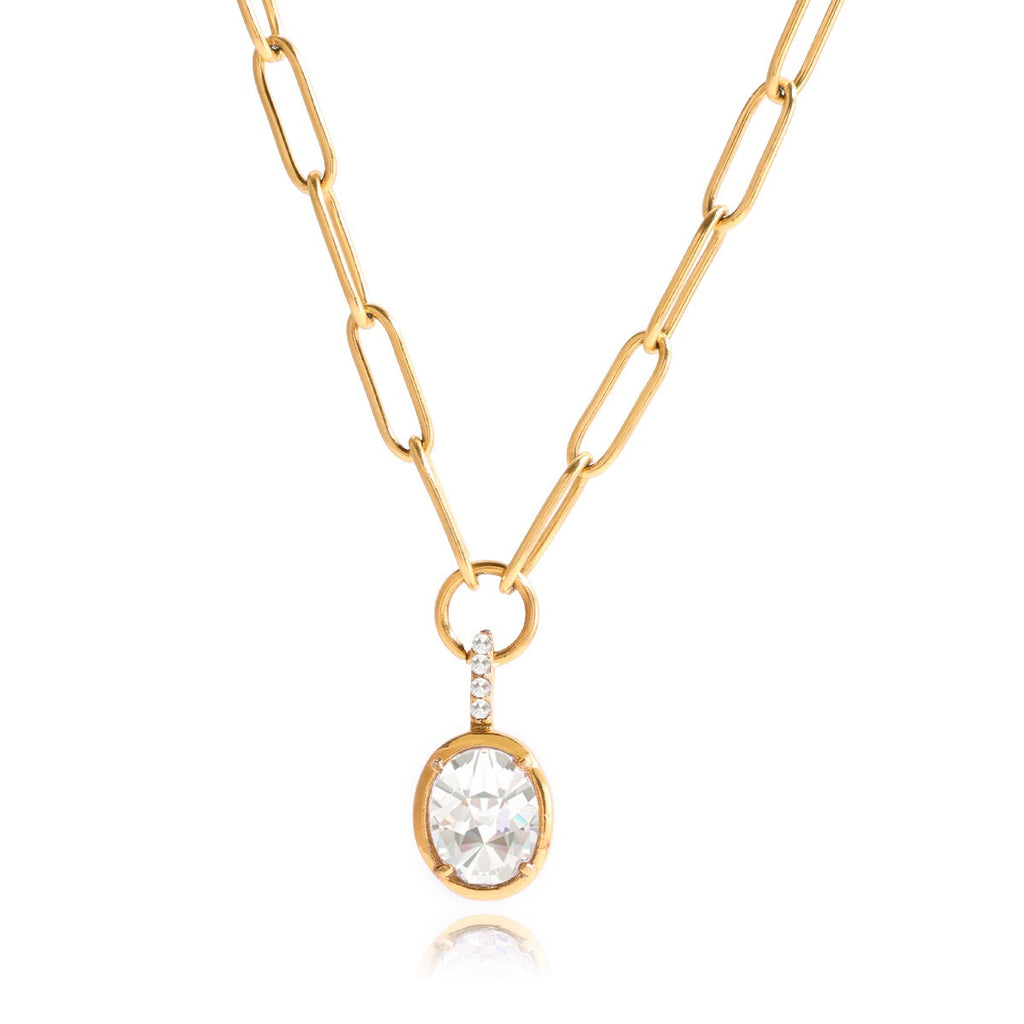 Gold necklace with a diamond pendant on a white background