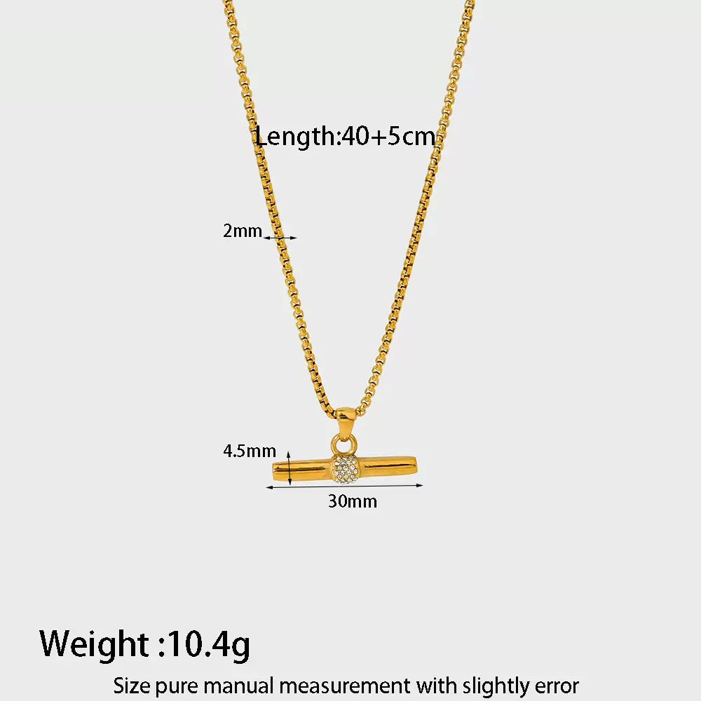 Gold necklace with measurements on a white background