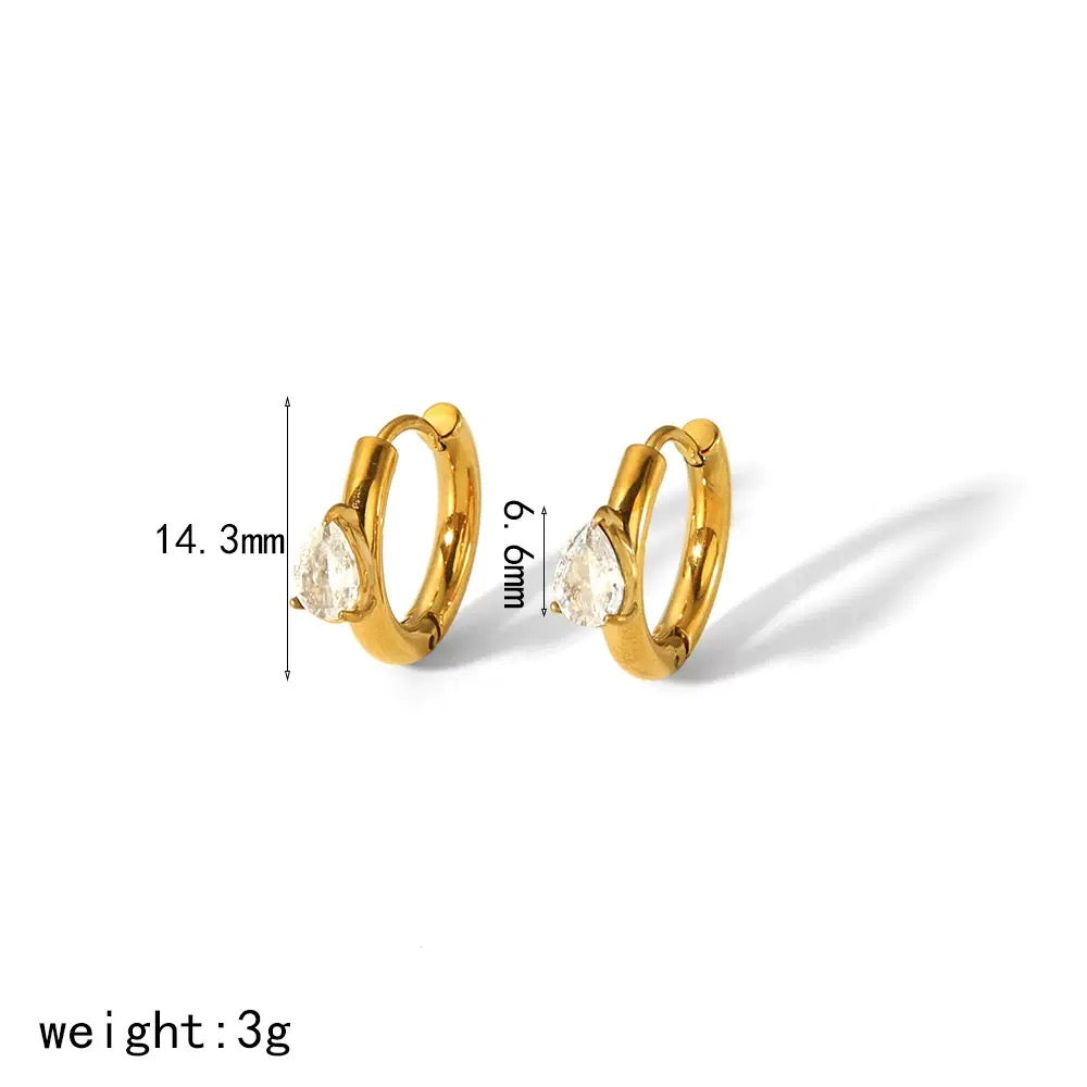 Gold hoop earrings with clear gemstones and measurements on a white background